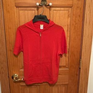 Bright orange 100% cashmere sweater by J crew in size L.